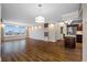 Bright living room featuring hardwood floors, a decorative ceiling and expansive windows with city views at 5220 Brittany S Dr # 1409, St Petersburg, FL 33715