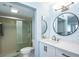 Modern bathroom with a glass-enclosed shower, vanity with stylish fixtures, and contemporary design at 5279 Isla Key S Blvd # 313, St Petersburg, FL 33715