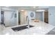 Well-lit kitchen with granite countertops, a stainless steel sink, and modern finishes at 5279 Isla Key S Blvd # 313, St Petersburg, FL 33715