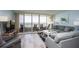 Relaxing living room with water views from the balcony and comfortable seating arrangements at 5279 Isla Key S Blvd # 313, St Petersburg, FL 33715