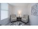 Cozy sitting room with comfortable armchairs, stylish decor, and ample natural light at 5279 Isla Key S Blvd # 313, St Petersburg, FL 33715