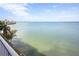 Scenic view from the balcony overlooking the serene ocean and distant coastline at 5279 Isla Key S Blvd # 313, St Petersburg, FL 33715