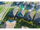 Aerial view of a single-Gathering home with pool, landscaping and a well maintained lawn at 5807 Silver Sun Dr, Apollo Beach, FL 33572
