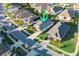 Aerial view of a single-Gathering home showcases its driveway, lawn and neighborhood setting at 5807 Silver Sun Dr, Apollo Beach, FL 33572
