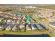An aerial view showing the property's location in a community with surrounding lakes at 5807 Silver Sun Dr, Apollo Beach, FL 33572