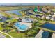 An aerial view of a home near a community pool and recreational area at 5807 Silver Sun Dr, Apollo Beach, FL 33572