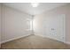 Inviting carpeted bedroom with a bright window and a double-door closet at 5807 Silver Sun Dr, Apollo Beach, FL 33572