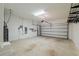 Spacious two-car garage with ample storage and a clean, functional design at 5807 Silver Sun Dr, Apollo Beach, FL 33572