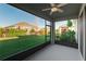 Spacious screened lanai with a ceiling fan overlooking the backyard at 5807 Silver Sun Dr, Apollo Beach, FL 33572
