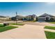 A quiet residential street features well-maintained lawns and attractive single-Gathering homes at 5807 Silver Sun Dr, Apollo Beach, FL 33572