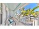 Balcony with chairs overlooking a green landscape at 615 Islebay Dr, Apollo Beach, FL 33572