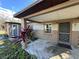 Charming front porch with decorative columns and brick accents enhance curb appeal at 6411 N 34Th St, Tampa, FL 33610