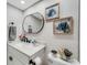 Bathroom featuring updated vanity with quartz countertop and decorative elements at 7623 Radcliffe Cir # A101, Port Richey, FL 34668