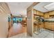 Open-concept layout showing the kitchen, dining area, and living space at 7623 Radcliffe Cir # A101, Port Richey, FL 34668