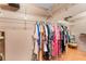 Spacious walk-in closet with ample storage and a full-length mirror at 7623 Radcliffe Cir # A101, Port Richey, FL 34668
