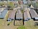 Birds eye view showcases fenced backyards and proximity to neighbors in a residential area at 7853 Bristol Park Dr, Apollo Beach, FL 33572