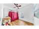Spare bedroom with ceiling fan, closet, and window at 7853 Bristol Park Dr, Apollo Beach, FL 33572