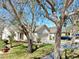 Beautiful home featuring mature trees, a well-manicured lawn, and inviting curb appeal at 7853 Bristol Park Dr, Apollo Beach, FL 33572