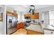 Well-equipped kitchen features stainless steel appliances and a breakfast bar at 7853 Bristol Park Dr, Apollo Beach, FL 33572