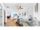 Bright main bedroom with ceiling fan and an ensuite bathroom at 7853 Bristol Park Dr, Apollo Beach, FL 33572