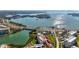 Stunning aerial view of waterfront community, showcasing expansive water views and lush surroundings at 7867 Sailboat Key Blvd S # 201, South Pasadena, FL 33707