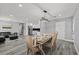 Bright eat in dining area with contemporary chandelier, seating, and decor at 8501 N Alaska St, Tampa, FL 33604