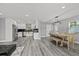 Spacious open floorplan with an eat in dining area and newly renovated kitchen at 8501 N Alaska St, Tampa, FL 33604