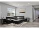 Inviting living room boasts modern grey walls, contemporary furnishings, and stylish decor at 8501 N Alaska St, Tampa, FL 33604
