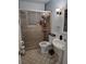 Well-maintained bathroom with updated fixtures, including a tiled shower with glass door at 8588 95Th Ave, Seminole, FL 33777