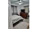 Cozy bedroom with natural light, neutral decor, and stylish furnishings at 8588 95Th Ave, Seminole, FL 33777