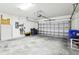 Spacious two car garage with ample storage and organization solutions, providing convenient parking at 958 Sombra St, Tampa, FL 33619
