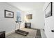 Bright room with a treadmill and natural light, providing a perfect space for an exercise area at 958 Sombra St, Tampa, FL 33619