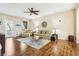 Spacious living room featuring hardwood floors, neutral walls, and comfortable seating at 958 Sombra St, Tampa, FL 33619