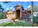Charming home with well-maintained landscaping and an attached two-car garage at 10222 Woodford Bridge St, Tampa, FL 33626