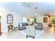Inviting living room with comfortable seating, neutral decor, and ample natural light, perfect for relaxation and gatherings at 10222 Woodford Bridge St, Tampa, FL 33626