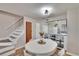 Inviting dining area with hardwood floors and views of the kitchen at 11308 Grandville Dr, Temple Terrace, FL 33617