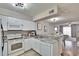 Well-equipped kitchen featuring stainless steel appliances and granite countertops at 11308 Grandville Dr, Temple Terrace, FL 33617