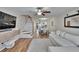Spacious living room with hardwood floors and open-concept design at 11308 Grandville Dr, Temple Terrace, FL 33617