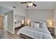 Spacious main bedroom featuring a large bed, closet, and ceiling fan at 11308 Grandville Dr, Temple Terrace, FL 33617
