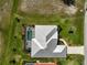 Aerial view of residence with lanai, pool and pristine landscaping at 12 Medalist Ter, Rotonda West, FL 33947