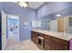 Bathroom featuring vanity with double sinks and lots of counter space at 12 Medalist Ter, Rotonda West, FL 33947