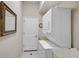 Laundry room featuring a stacked washer and dryer at 12 Medalist Ter, Rotonda West, FL 33947