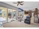 Bright open floorplan featuring a comfortable living area and kitchen, with sliding glass doors leading to outdoor living at 12 Medalist Ter, Rotonda West, FL 33947