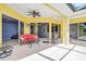 Outdoor patio with comfortable seating, ideal for relaxation and entertaining at 12 Medalist Ter, Rotonda West, FL 33947