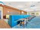 Bright dining area featuring booth seating and contemporary decor at 1214 Godavari Way, Wesley Chapel, FL 33543