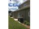 Exterior showing the home's well-maintained siding and landscaping, offering an inviting outdoor space at 1214 Godavari Way, Wesley Chapel, FL 33543