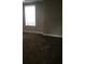 Spacious living room with neutral paint and carpet, offering a blank canvas for personalization and natural light at 1214 Godavari Way, Wesley Chapel, FL 33543