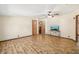 Spacious living room featuring laminate floors and natural light at 12519 Cambridge Ave, Tampa, FL 33624
