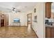 Open-concept living room with easy access to other living spaces at 12519 Cambridge Ave, Tampa, FL 33624