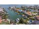 Stunning waterfront home with boat dock, pool, and lush landscaping in desirable waterfront community at 137 11Th E St, Tierra Verde, FL 33715
